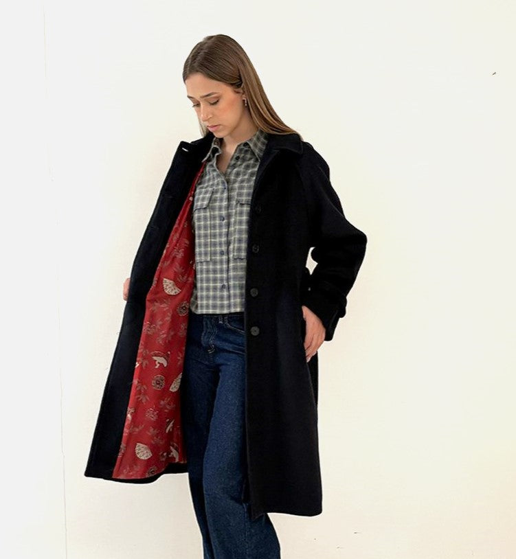 Cappotto con bottoni / Merci